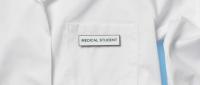 White coat with a name tag reading "Medical Student."